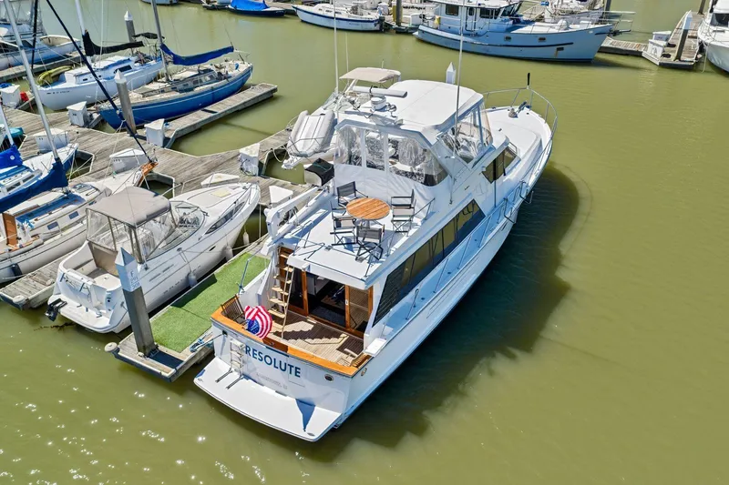 Slide: The Image of Ocean Alexander 520 Pilothouse yacht docked at marina, aerial view, 1991 model. - 4