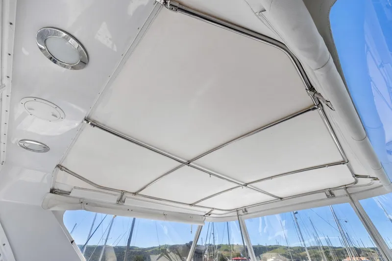 Slide: The Image of Ceiling view of 1991 Ocean Alexander 520 Pilothouse with circular lights and clear windows. - 44