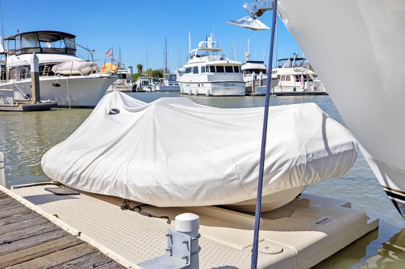 Slide: The Image of Covered boat docked at marina, Ocean Alexander 520 Pilothouse, 1991 model. - 59