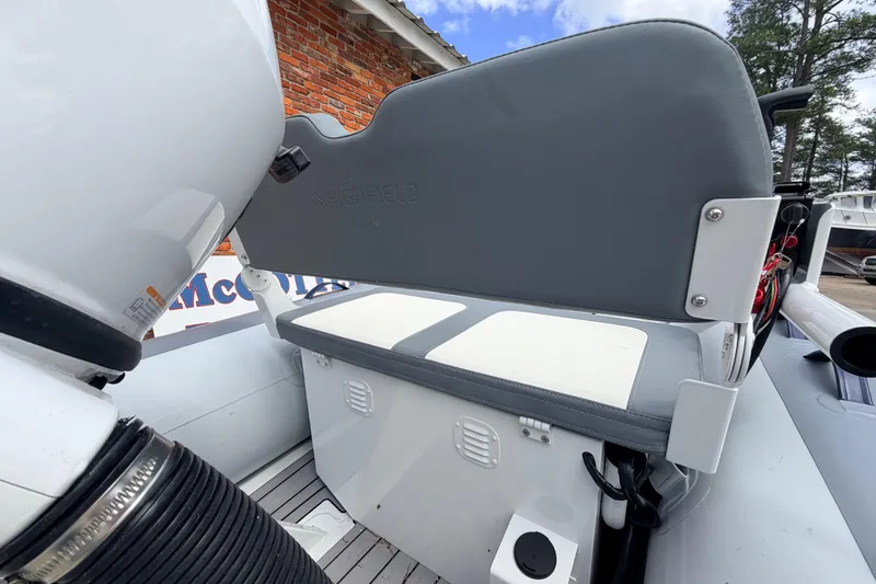 Slide: The Image of 2023 Highfield Classic 380 FCT boat seat and motor detail. - 15