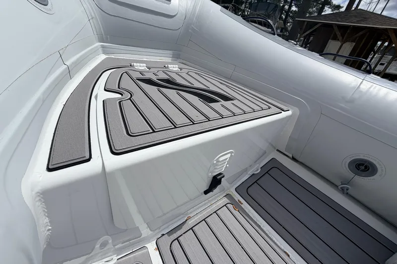 Slide: The Image of 2023 Highfield Classic 380 FCT boat interior with sleek, modern design and durable flooring. - 18