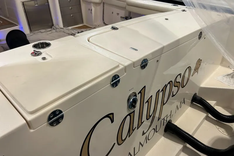 Slide: The Image of 2020 Grady-White Freedom 375 boat interior with "Calypso" branding, Falmouth, MA. - 15