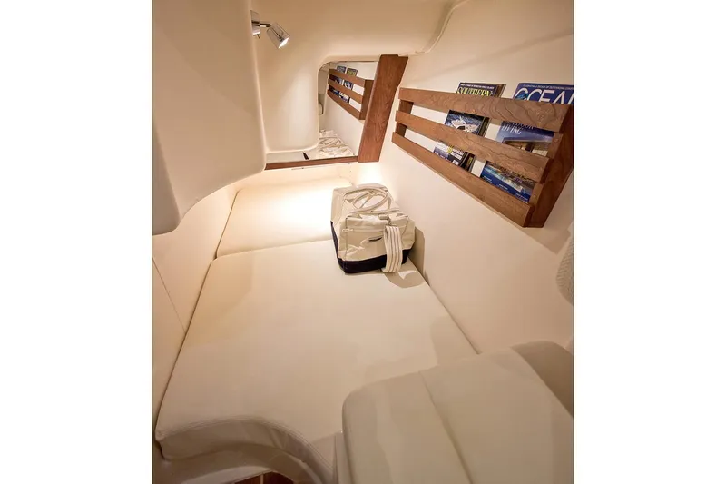 Slide: The Image of Manufacturer Provided Image: Interior cabin of 2020 Grady-White Freedom 375 boat with cozy seating and storage. - 21