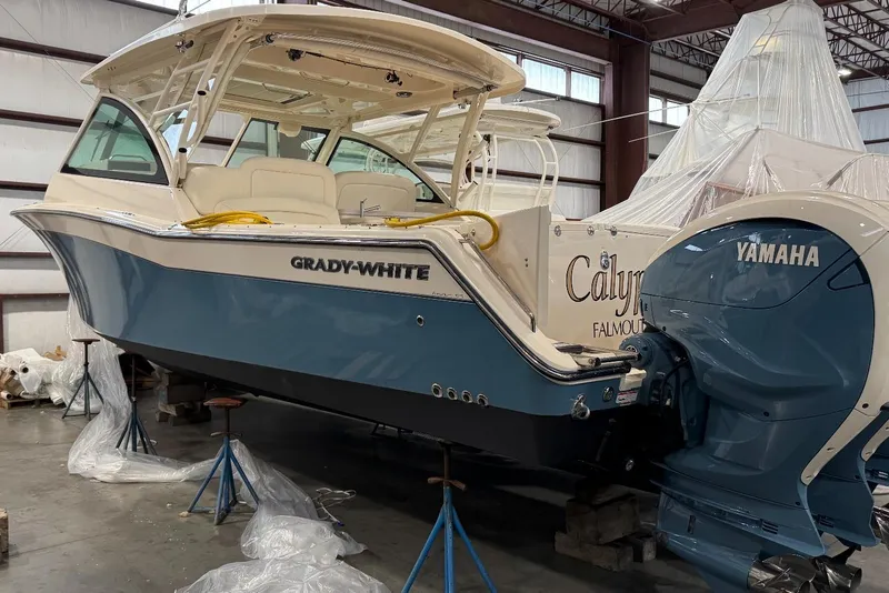Slide: The Image of 2020 Grady-White Freedom 375 boat with Yamaha engines in a storage facility. - 7