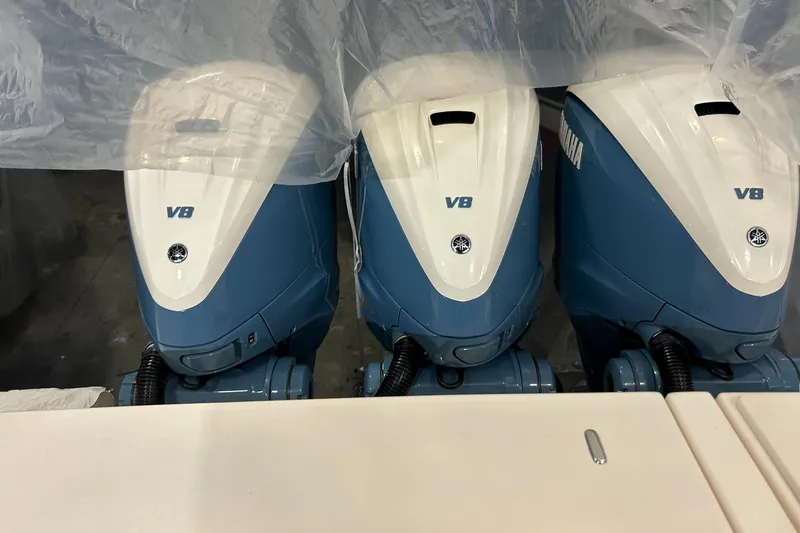 Slide: The Image of Triple Yamaha V8 outboard engines on a 2020 Grady-White Freedom 375 boat. - 9