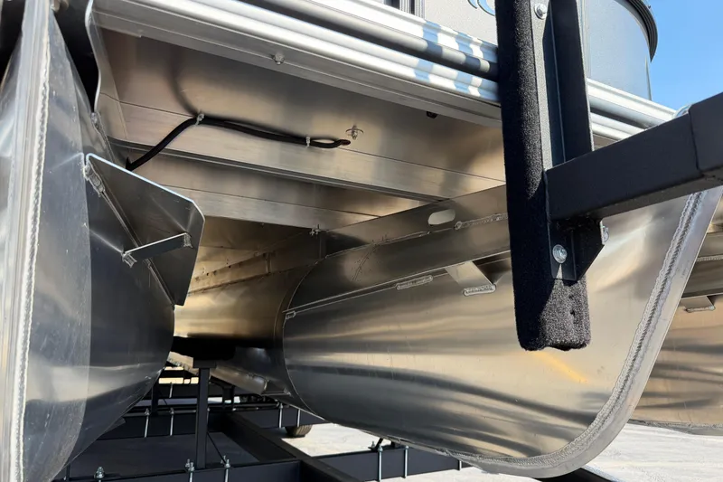 Slide: The Image of Underneath view of 2026 Crest Conquest 250 SLSC pontoon boat, showcasing aluminum structure. - 12