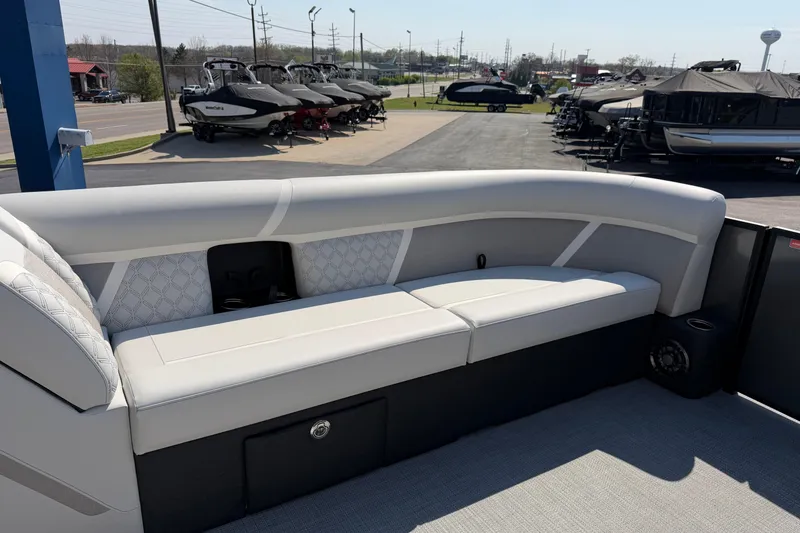 Slide: The Image of 2026 Crest Conquest 250 SLSC boat interior with sleek seating and modern design. - 14