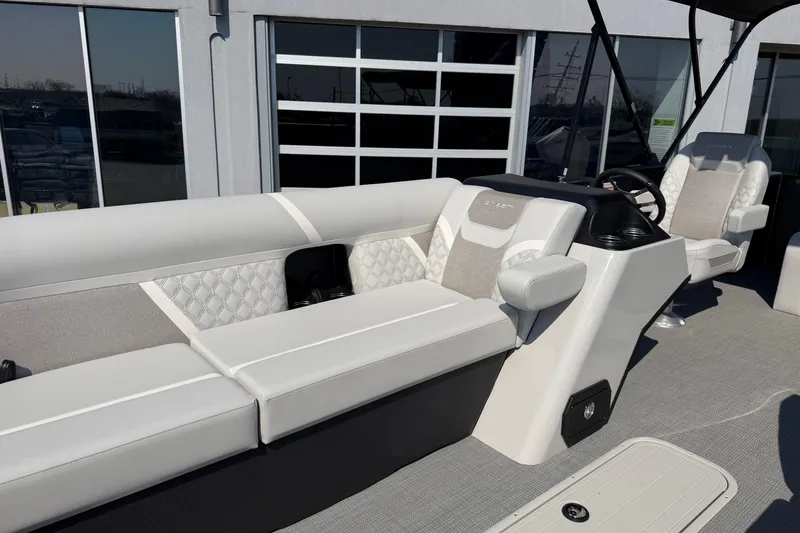Slide: The Image of 2026 Crest Conquest 250 SLSC boat interior with luxurious seating and modern design. - 15