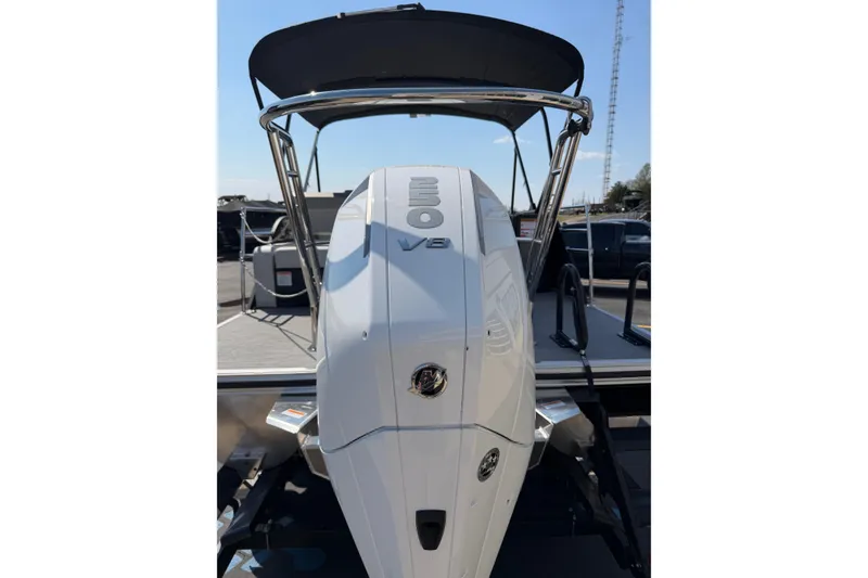 Slide: The Image of 2026 Crest Conquest 250 SLSC boat with powerful V8 engine, rear view. - 8