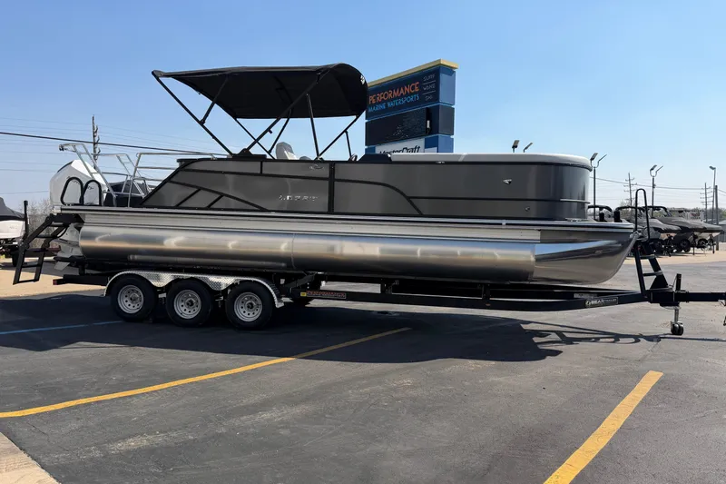 Slide: The Image of 2026 Crest Conquest 250 SLSC pontoon boat on trailer at dealership. - 9