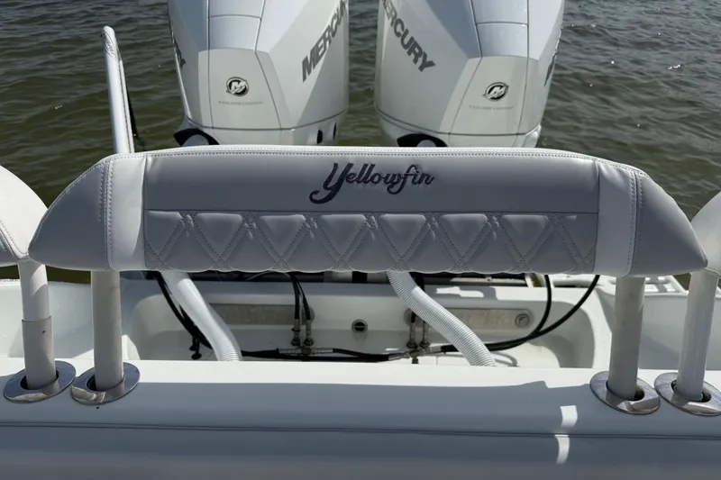 Slide: The Image of 2023 Yellowfin 26 Hybrid boat with Mercury engines, featuring sleek design and branding. - 17