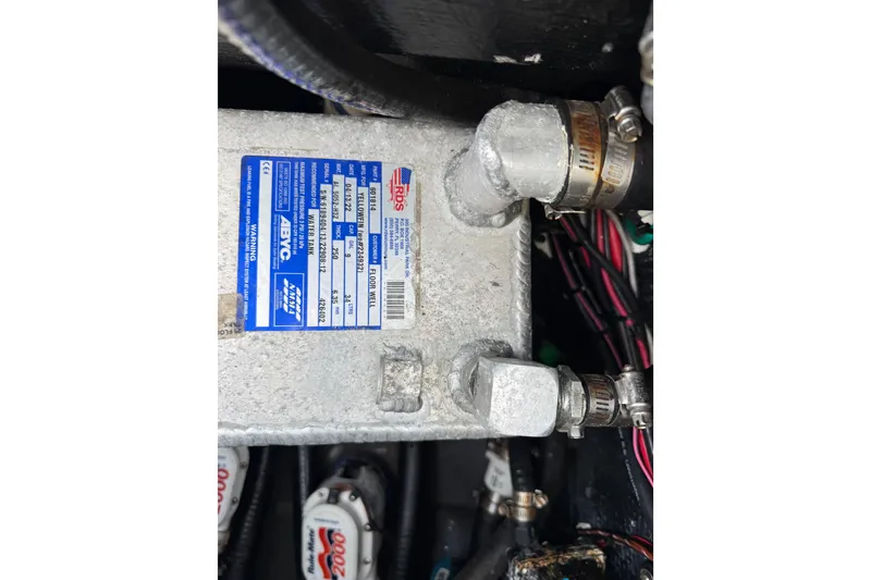 Slide: The Image of Close-up of a 2023 Yellowfin 26 Hybrid boat component with label and wiring. - 19