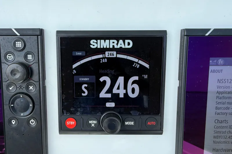 Slide: The Image of Simrad navigation display on 2023 Yellowfin 26 Hybrid boat dashboard. - 40
