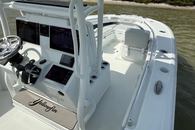 Slide: The Image of 2023 Yellowfin 26 Hybrid boat interior with advanced navigation system and sleek design. - 46