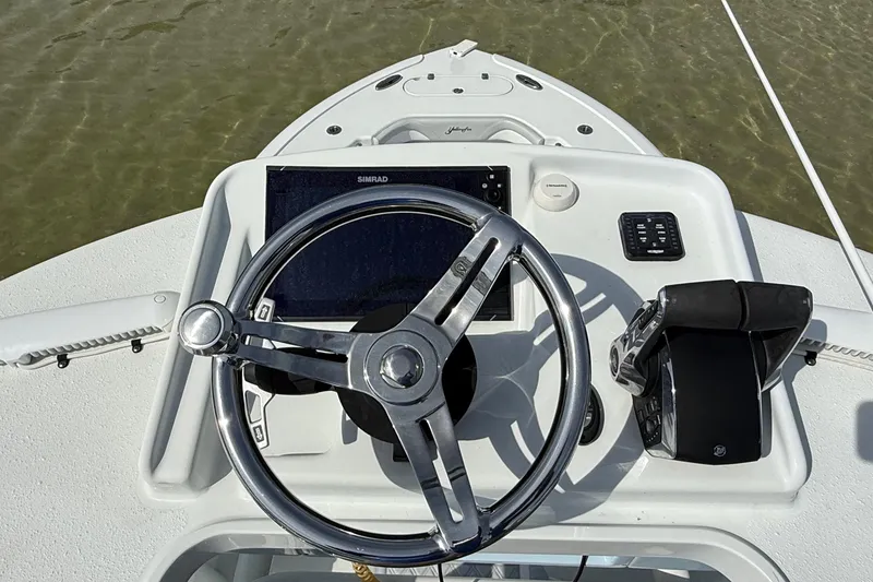 Slide: The Image of Steering console of 2023 Yellowfin 26 Hybrid boat with navigation equipment. - 69