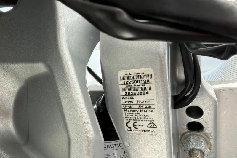 Slide: The Image of Label on 2023 Yellowfin 26 Hybrid boat engine, showing model and serial numbers. - 81