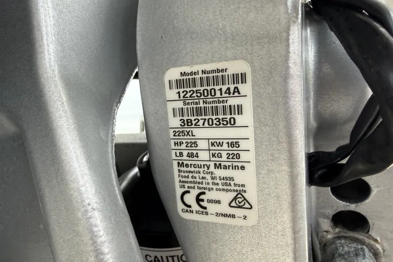 Slide: The Image of Label on a 2023 Yellowfin 26 Hybrid boat engine, showing model and serial numbers. - 82