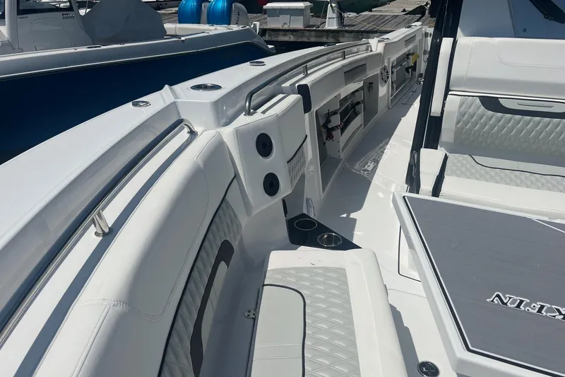 Slide: The Image of 2023 Blackfin 302 CC boat interior with luxurious seating and modern design. - 20