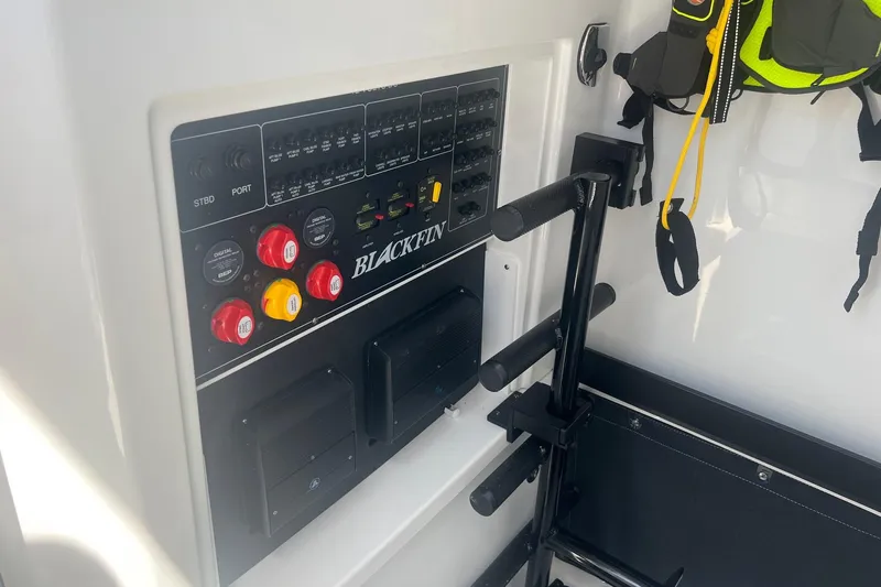 Slide: The Image of Control panel of 2023 Blackfin 302 CC boat with safety equipment. - 29
