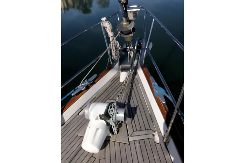 Slide: The Image of Bow of 2001 Beneteau 50 yacht with anchor chain and winch system. - 15