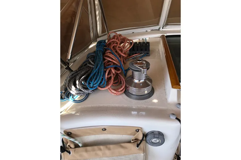 Slide: The Image of Deck of 2001 Beneteau 50 sailboat with ropes and winch. - 22