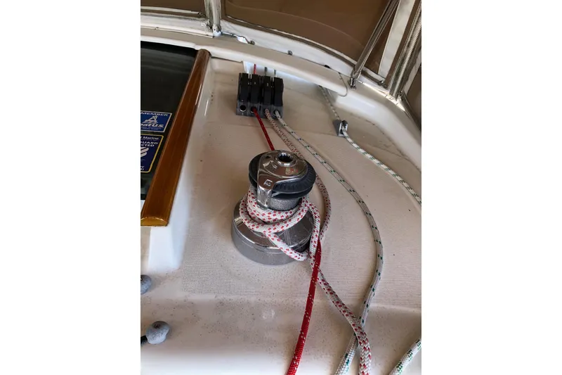 Slide: The Image of Winch and ropes on 2001 Beneteau 50 sailboat deck. - 23