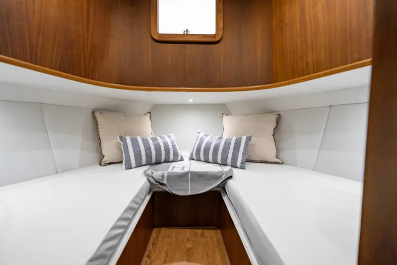Slide: The Image of Luxurious cabin interior of 2025 Rybovich Custom Margaritavich yacht with elegant bedding. - 28