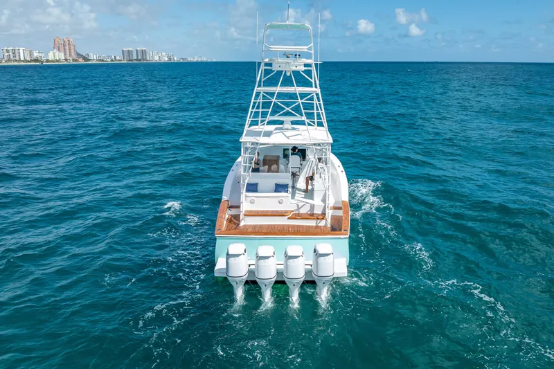 Slide: The Image of 2025 Rybovich Custom Margaritavich yacht cruising on open ocean waters. - 8