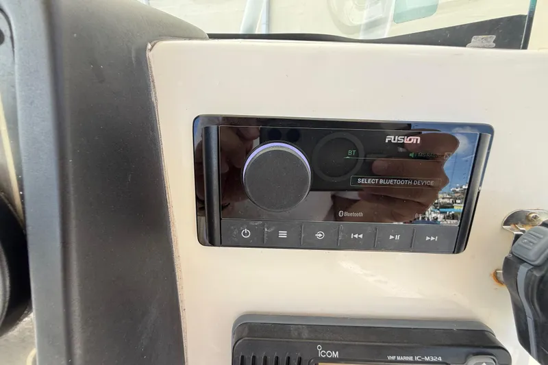 Slide: The Image of Fusion audio system on 2016 Sea Fox 226 Commander boat dashboard. - 15