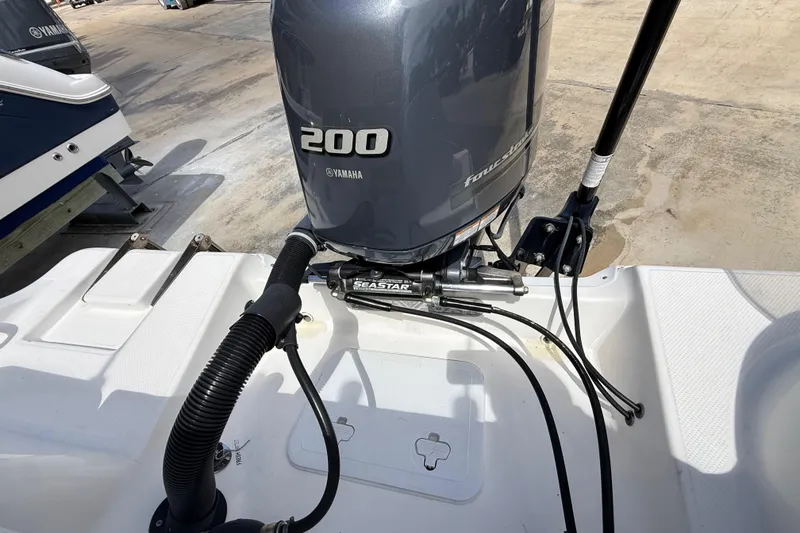 Slide: The Image of Outboard motor on a 2016 Sea Fox 226 Commander boat, featuring Yamaha 200 horsepower engine. - 27