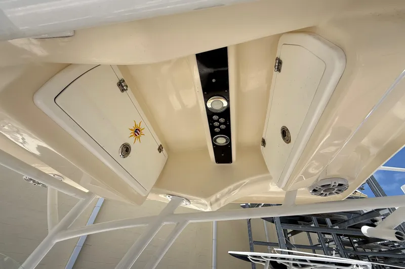 Slide: The Image of 2016 Sea Fox 226 Commander boat console with storage compartments and control panel. - 31