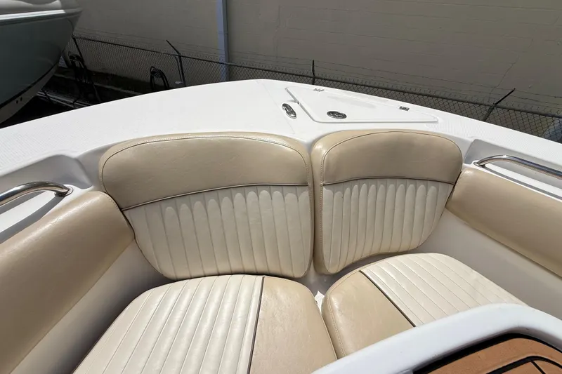 Slide: The Image of 2016 Sea Fox 226 Commander boat interior with beige cushioned seating. - 37