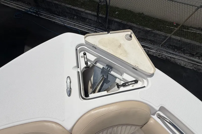 Slide: The Image of Open anchor compartment on 2016 Sea Fox 226 Commander boat, showing anchor storage. - 38