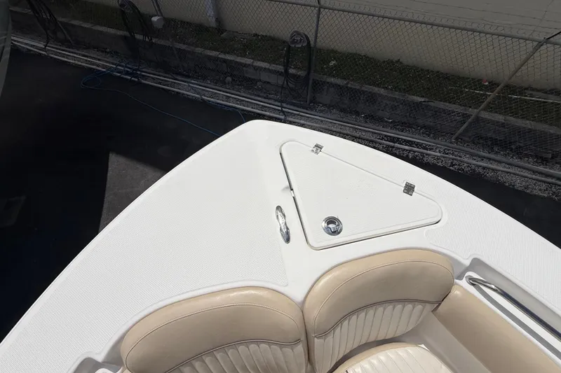 Slide: The Image of Bow seating area of a 2016 Sea Fox 226 Commander boat with storage compartment. - 40