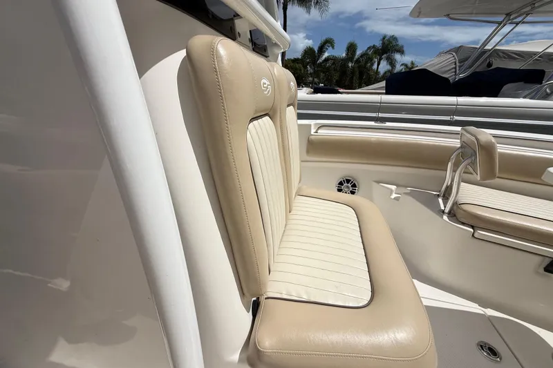Slide: The Image of 2016 Sea Fox 226 Commander boat interior with beige seating and sleek design. - 43