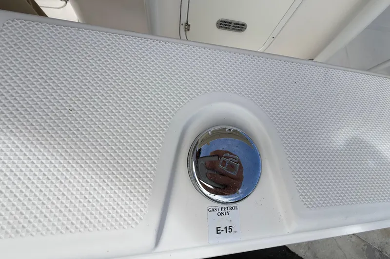 Slide: The Image of Fuel cap on 2016 Sea Fox 226 Commander boat, labeled "Gas/Petrol Only E-15". - 54