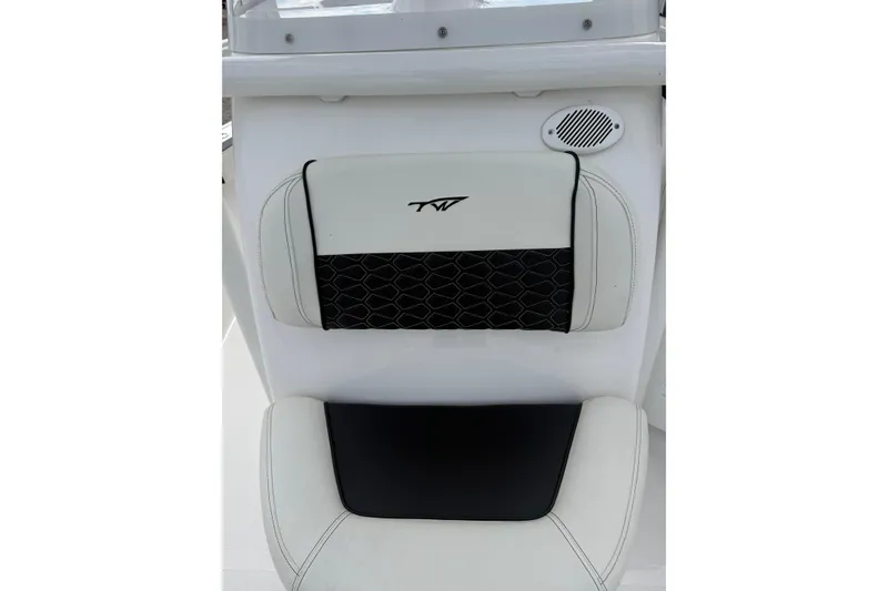 Slide: The Image of 2025 Tidewater 198 CC Adventure boat seat with black and white upholstery. - 10