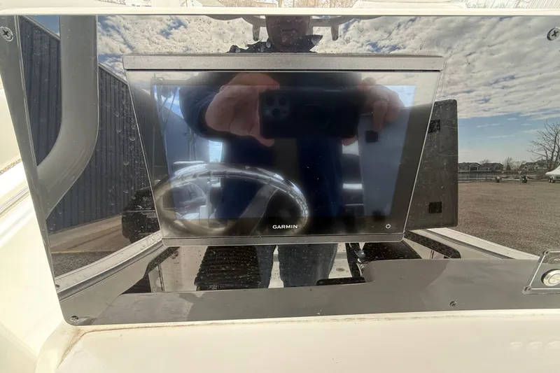 Slide: The Image of Garmin display on 2025 Tidewater 198 CC Adventure boat dashboard. - 12