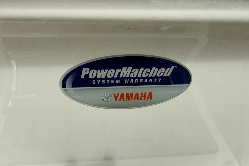 Slide: The Image of Sticker on 2025 Tidewater 198 CC Adventure boat, displaying Yamaha PowerMatched System Warranty. - 2
