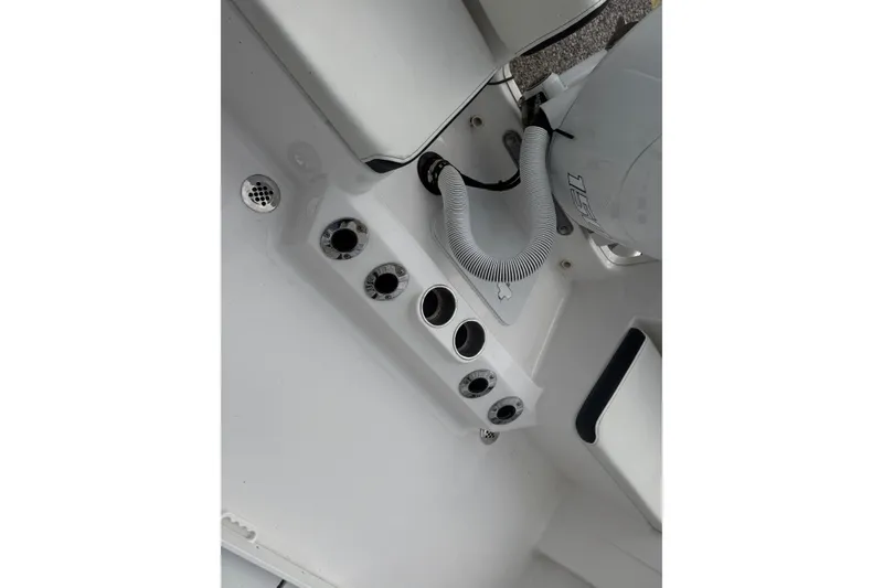 Slide: The Image of Interior view of 2025 Tidewater 198 CC Adventure boat, showcasing control panel and fittings. - 6