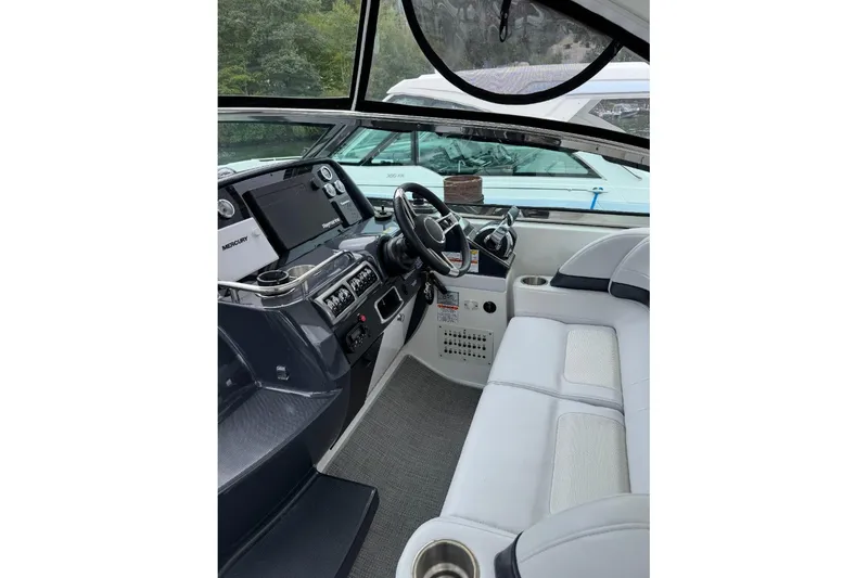 Slide: The Image of 2019 Formula 37 Performance Cruiser cockpit with modern controls and comfortable seating. - 15