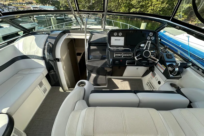 Slide: The Image of 2019 Formula 37 Performance Cruiser cockpit with modern helm and seating. - 18