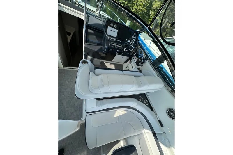 Slide: The Image of 2019 Formula 37 Performance Cruiser cockpit with white seating and modern controls. - 19