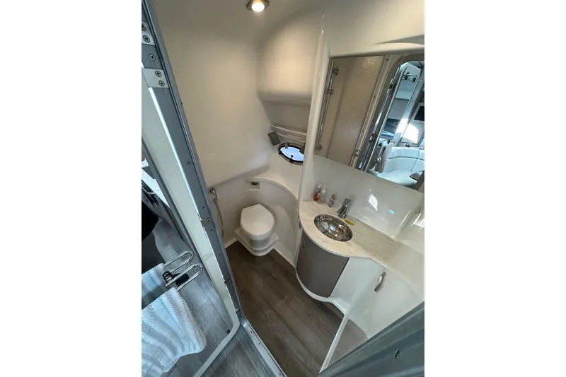 Slide: The Image of 2019 Formula 37 Performance Cruiser bathroom with modern fixtures and compact design. - 27