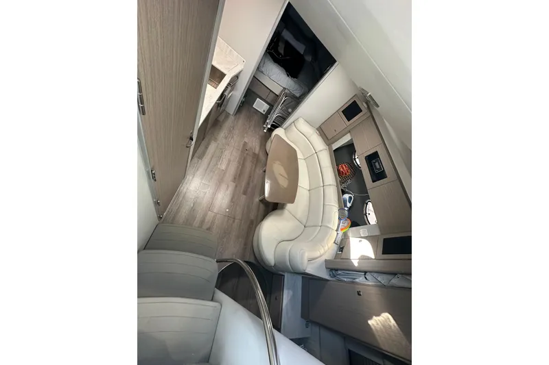 Slide: The Image of Interior of 2019 Formula 37 Performance Cruiser with modern seating and wood flooring. - 28