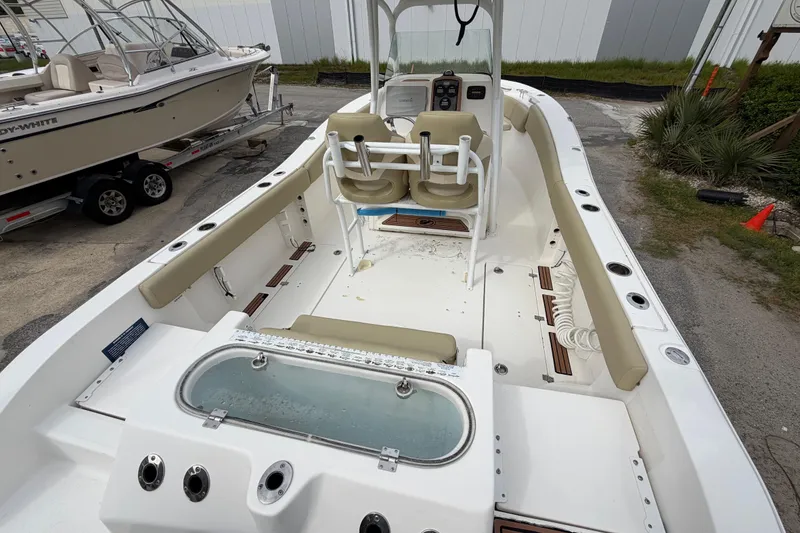 Slide: The Image of 2015 Sea Fox 266 Commander boat interior with seating and fishing amenities. - 14