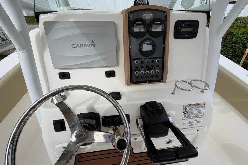 Slide: The Image of 2015 Sea Fox 266 Commander helm with Garmin display and Yamaha controls. - 22