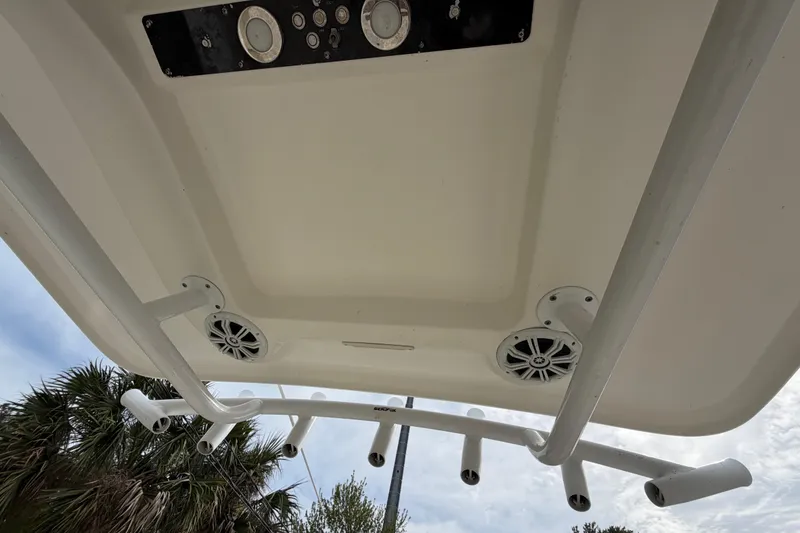 Slide: The Image of 2015 Sea Fox 266 Commander boat roof with rod holders and speakers. - 25