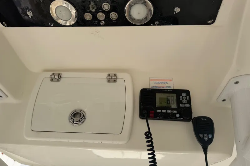 Slide: The Image of Control panel of a 2015 Sea Fox 266 Commander boat with radio equipment. - 31