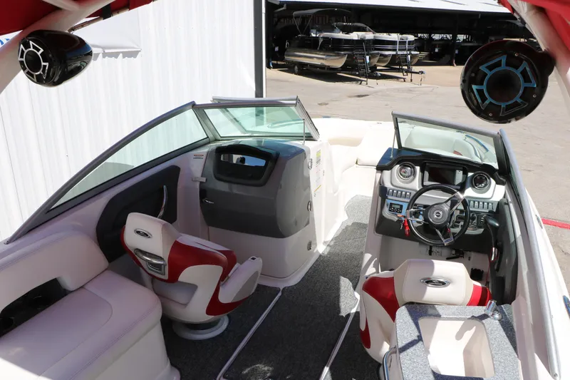 Slide: The Image of 2014 Chaparral 244 Xtreme boat interior with modern dashboard and seating. - 28